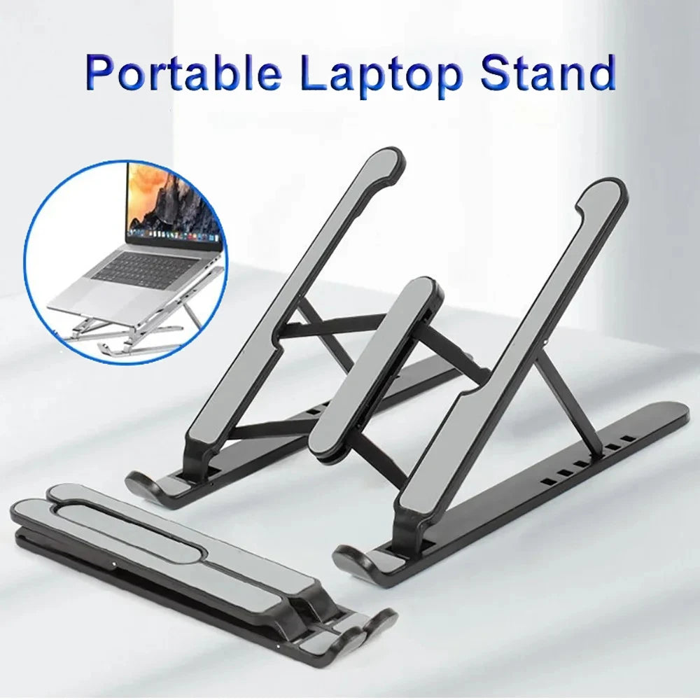 Aluminium laptop stand holding a laptop raised above the desk